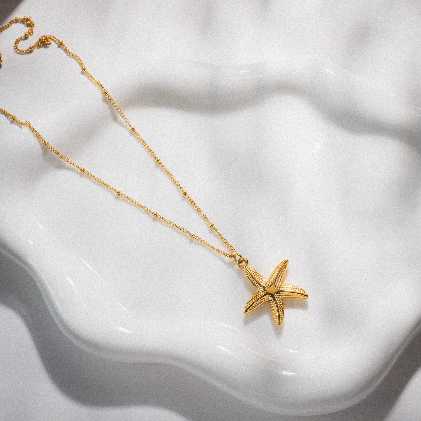 Gold Star Fish Necklace
